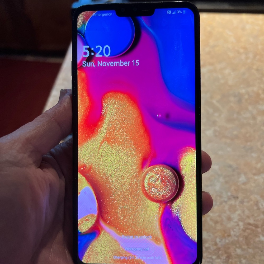 Lg v40 phone black 128 gb in perfect condition no scratches or cracks unlocked